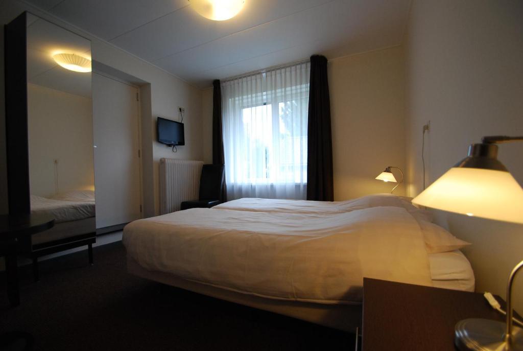 Boutique Hotel De Rozenhof Heilig Landstichting Rum bild