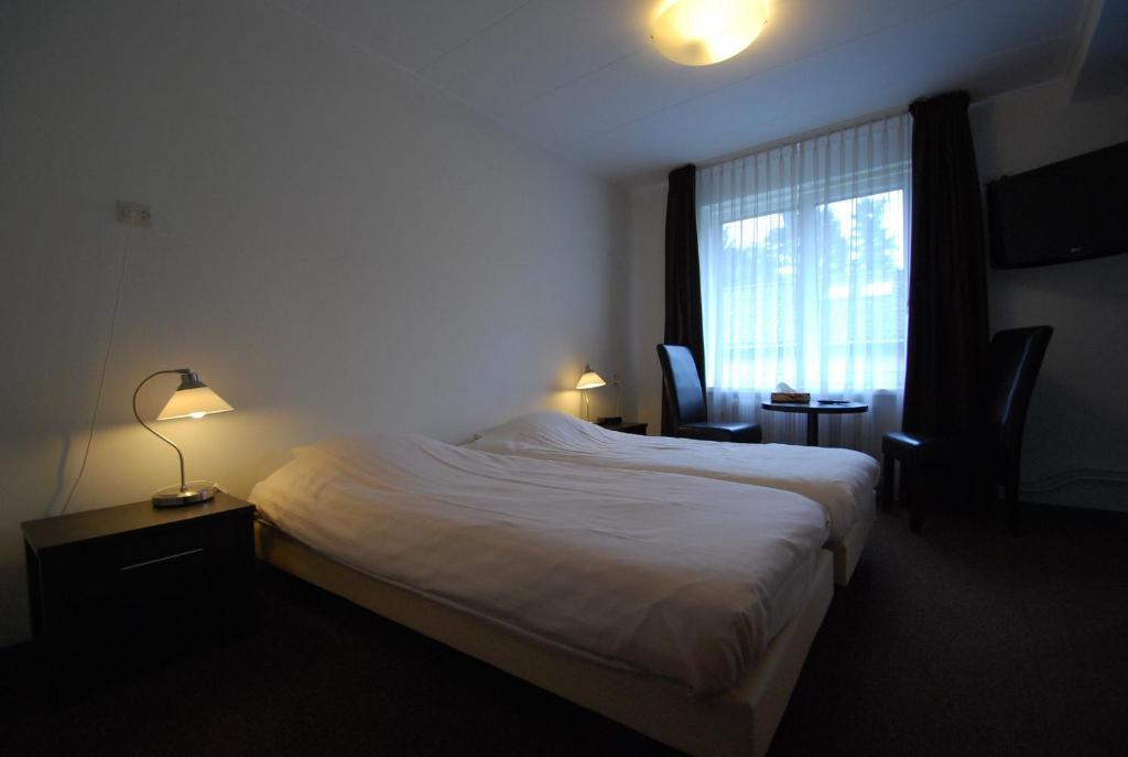 Boutique Hotel De Rozenhof Heilig Landstichting Rum bild